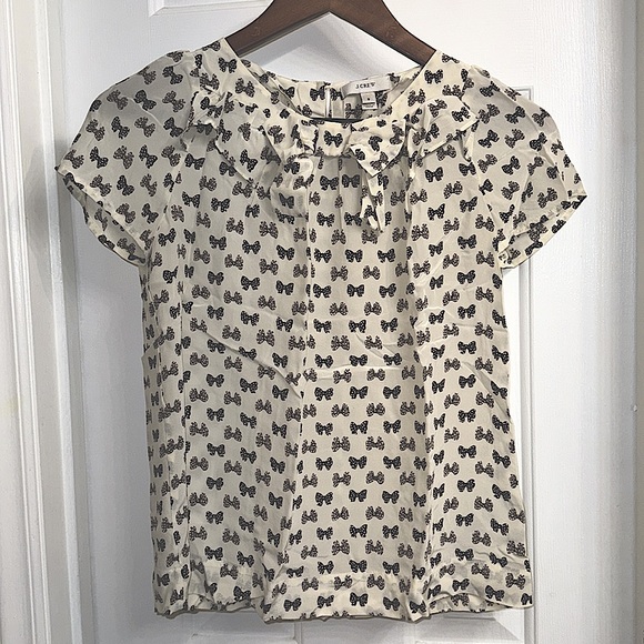 J. Crew Tops - J. CREW Silk blouse with bows print, size 0